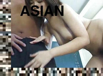 Asian in stockings happily sucks cock