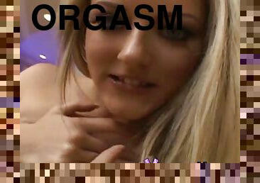 Horny blonde tastes her own cum in a solo clip