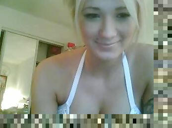 Blonde slut with nice fake titties on cam