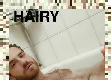 Hairy handsome German jerking in bathtub