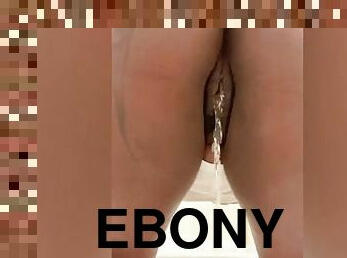 Ebony Bent Over Peeing