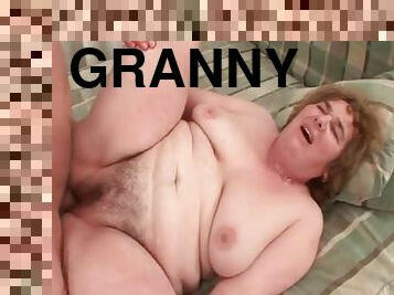 Floppy granny with rolls getting pounded by young guy