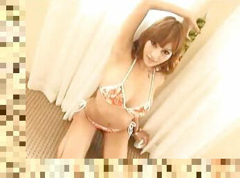 Stripping Japanese Hottie Exposes Her Huge Hooters