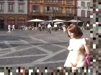 Naked girl walking through public streets