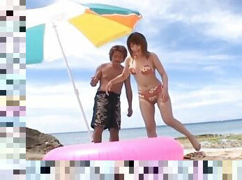 Horny Japanese girl Kyoko Fukazawa enjoys having sex on the beach