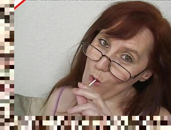 Nerdy mature chick with the red hair tries to give yet another blowjob