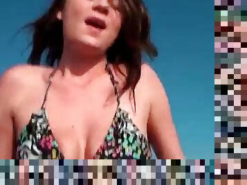 Sparkling pierced clit on chick fucking on the beach