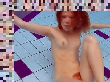 Underwater with a redheaded teen stripping