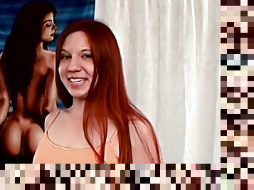 Redhead with small pierced tits strips completely nude and gives a sexy handjob