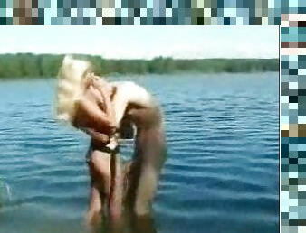 Outdoor fuck in the lake for blonde slut