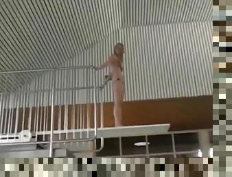 Hot teen gives head and fucks in a public pool changing room.