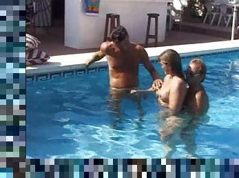 MILF get fucked with two guys at the swimming pool