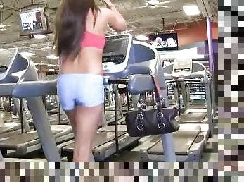 Brunette Teal is showing her sexy body in gym