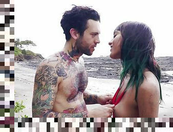 Tattooed man has a blast fucking Janice Griffith on a beach