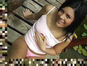 Brunette teen enjoys fucking her cunt using a toy in this outdoors scene