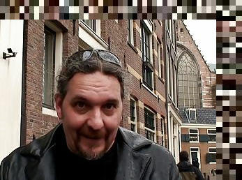 A tourist puts it to a hooker during his trip to Amsterdam