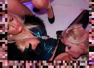 Beautiful clothed women in a club orgy
