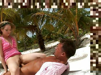 Blonde cutie Crystal enjoys sucking and riding a BBC on a beach