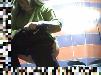 Great peeing with slender blonde in black pants