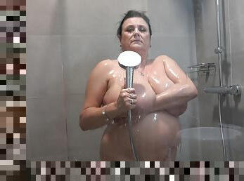 Chubby granny with big natural tits having some alone time