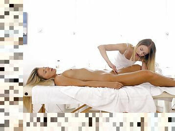 Softcore on the massage table for two lesbians