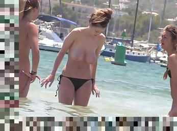 Voyeur films coeds at a topless beach