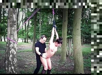 Slave in the woods tied to trees and fucked
