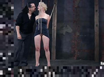 Inked blonde bitch simply adores being tied up in the dungeon