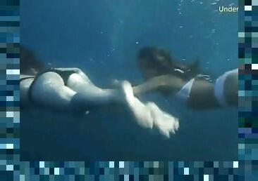 Bikini girls filmed underwater in the ocean