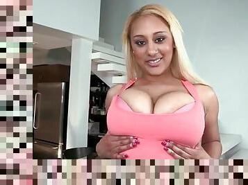Curvy blonde London fondles her huge tits