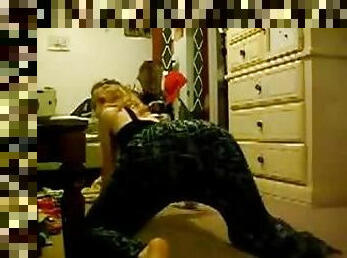 Amateur blonde stripping on the floor in a messy room