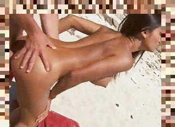 Hot tanned brunette get fucked on the beach