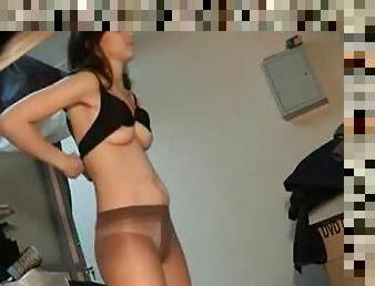 Petite brunette hottie in pantyhose stripping on cam