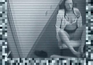 This babe gives a strip show to some dude under the security cam