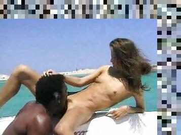 Hot interracial couple enjoy fucking on a boat