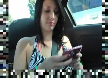 Cute girl texting in car and showing her pussy