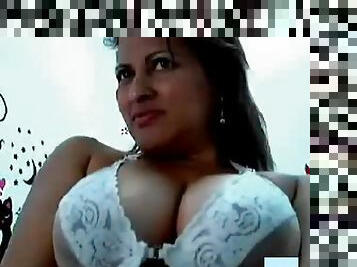 A hot busty and naughty milf on webcam.