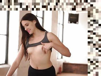 Braless babe flashes her tits while working out