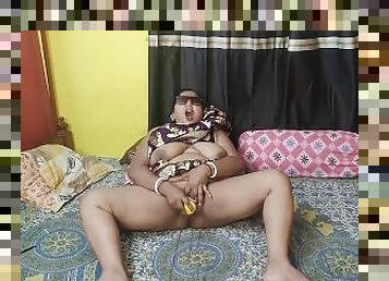 Indian young lady peeing in bed and squirting herself with diido