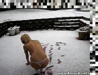 Topless amateur with big boobs playing outdoors in the snow