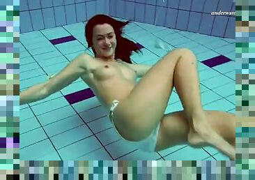 Juicy ass of brunette babe Alla Birtakik swims