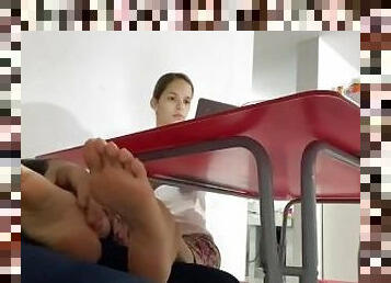 Footjob under the table