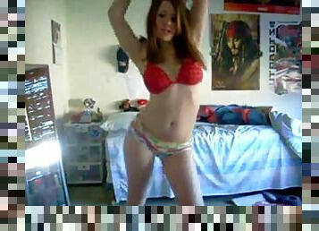 Stunning ginger teen strips and dances