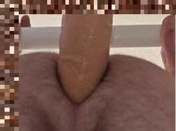 Dildo riding in the shower