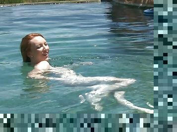 Redhead teen babe Katy Kiss sucks and fucks by the pool outdoors