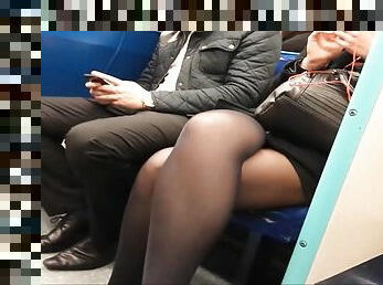 Hidden camera in the sexy legs films public transport
