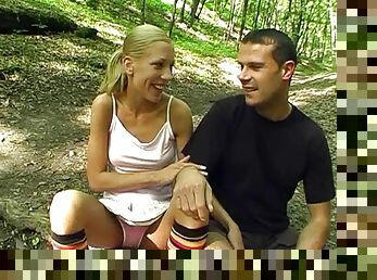 Skinny blonde teen in socks gives her cunt for a nice fuck in a forest