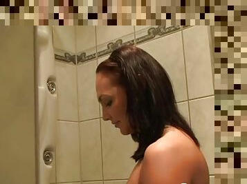 Beauty in the shower plays with her pussy