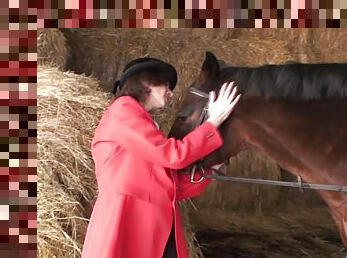 Mature chick Judi fingers her gaping cunt in a barn