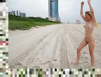 Nice natural tits Dixie loves playing naked on a public beach